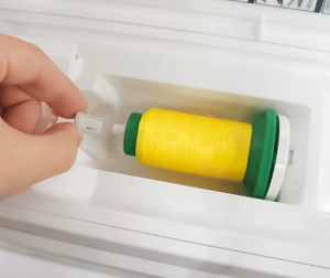 Blokada szpulki nici górnej 202233006 Janome